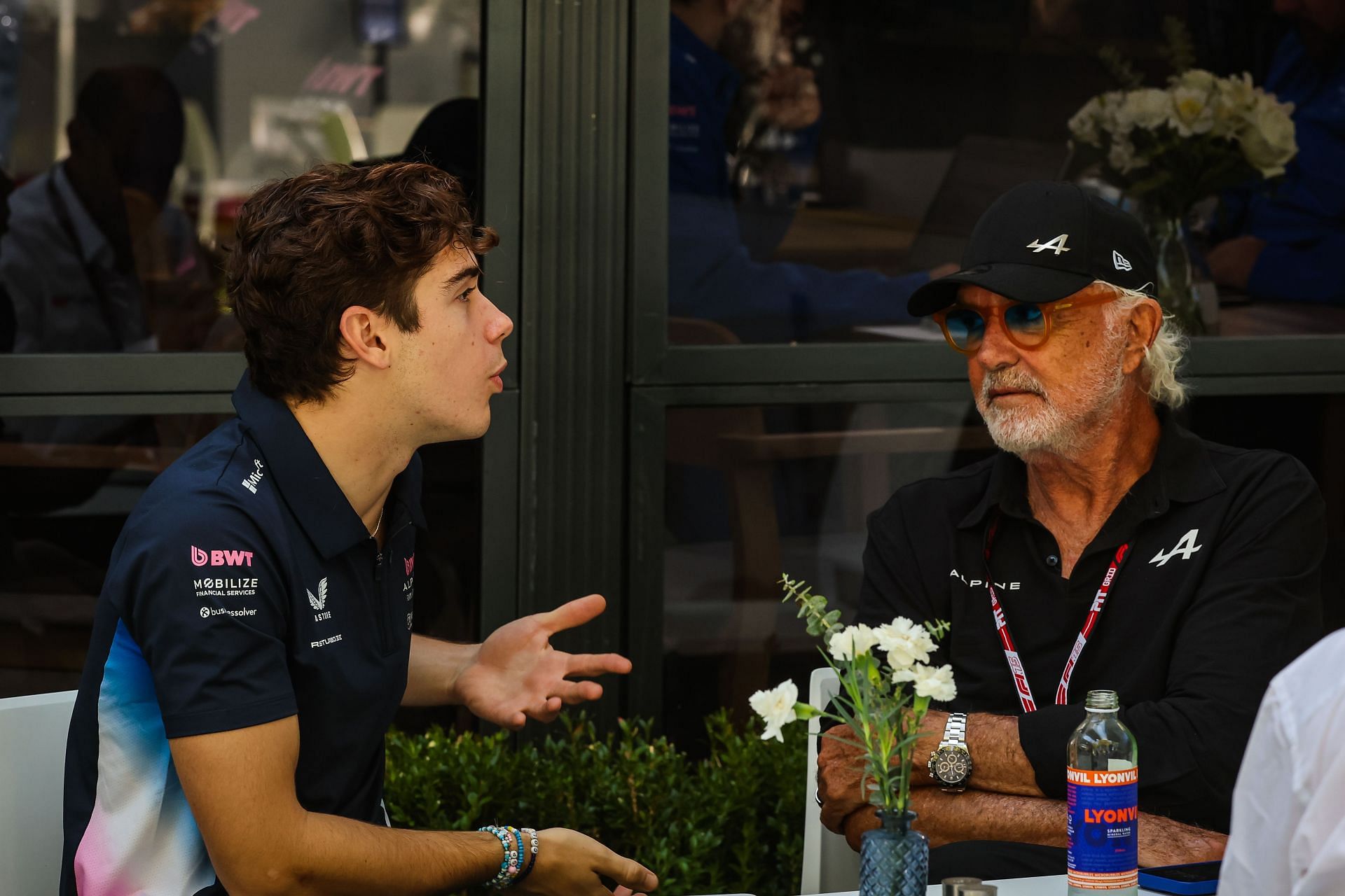 Franco Colapinto and Flavio Briatore speak in the Alpine Hospitality Suite during practice ahead of the F1 Grand Prix of Australia on March 14, 2025 - Source: Getty